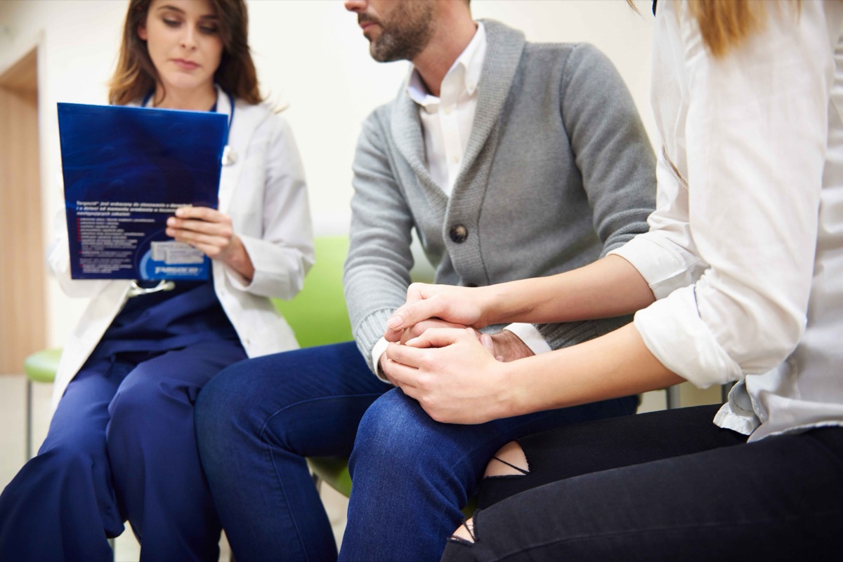 A researcher reviewing study details with a colleague