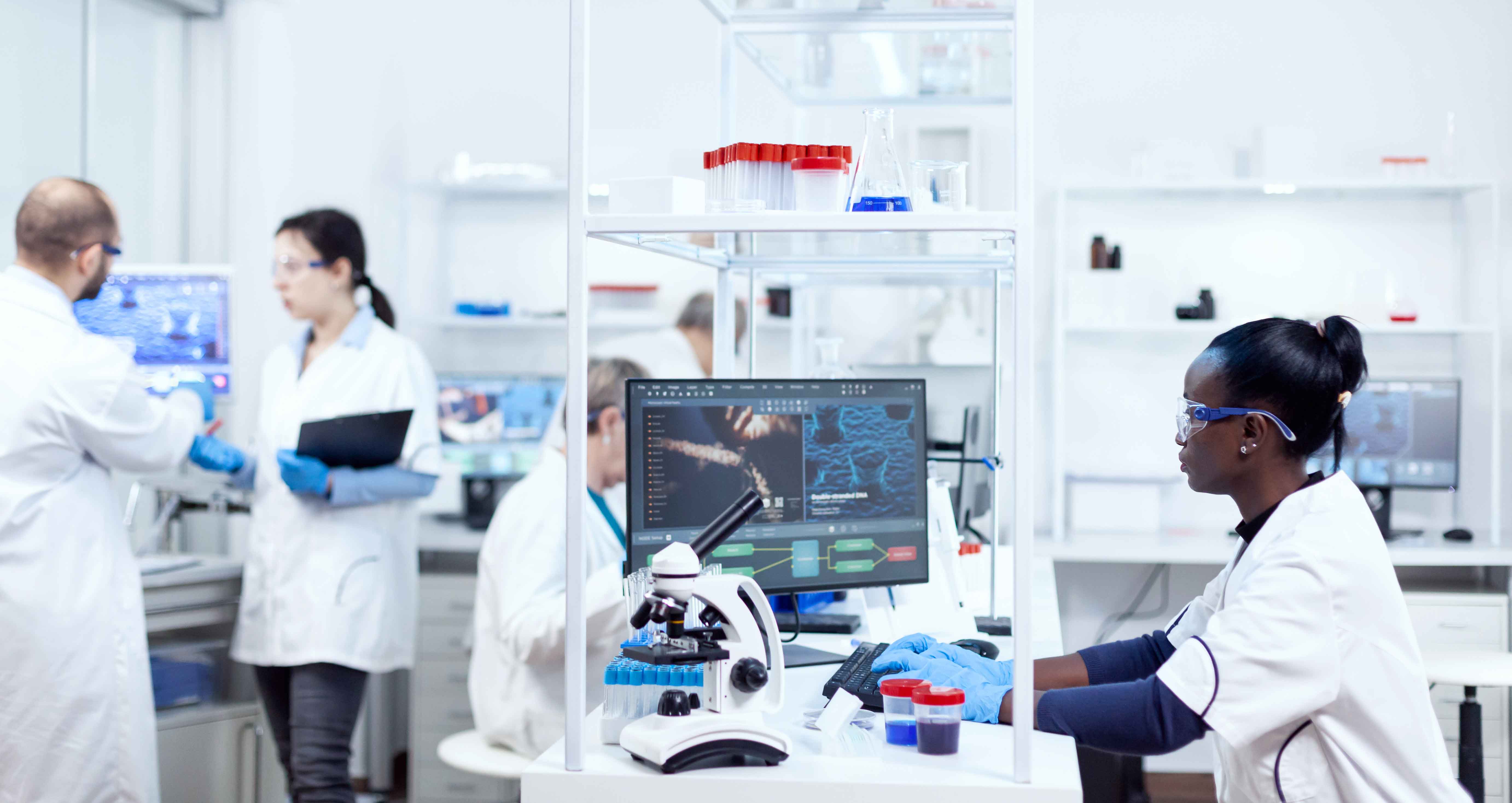 A clinical research team reviewing study information together