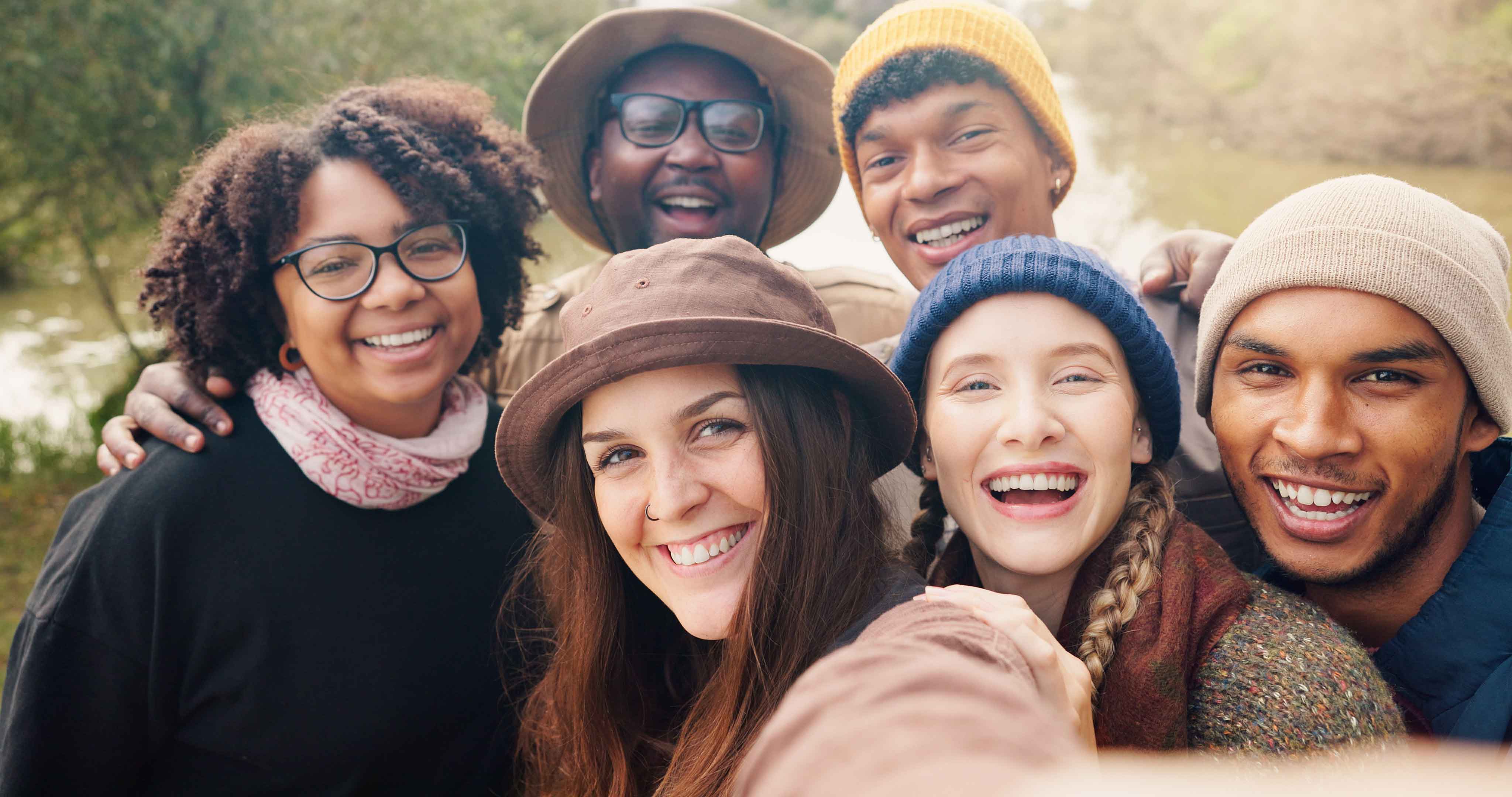 A diverse group of Ontario residents smiling together